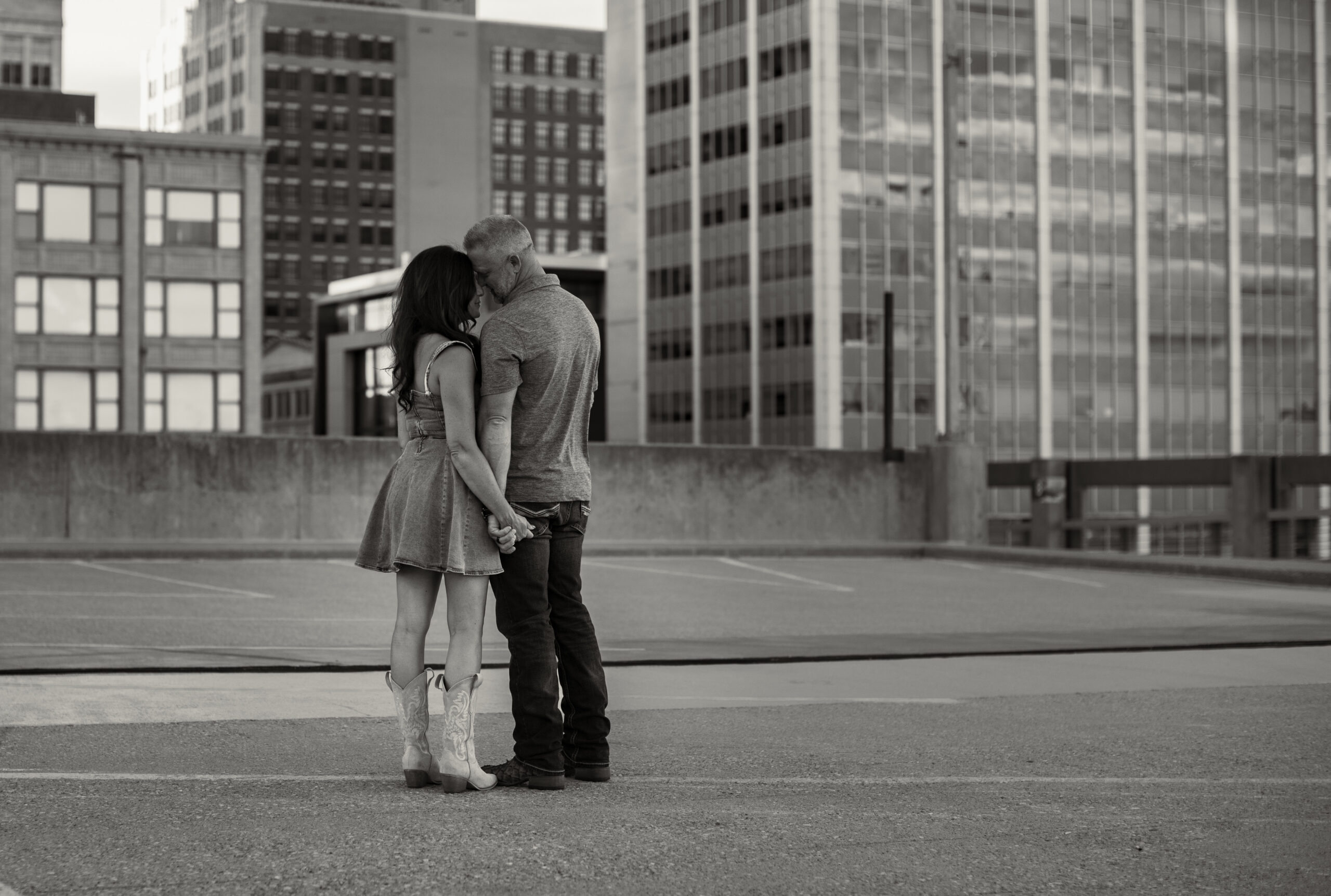 Couple embracing during a Kansas City couples photography session